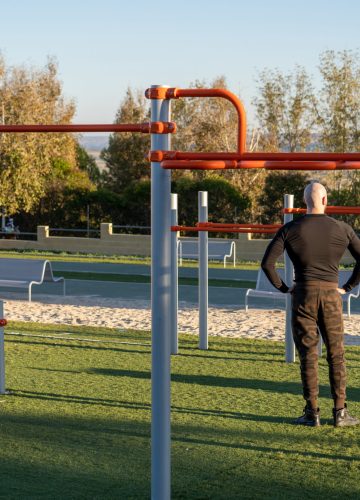 back-view-young-hispanic-man-having-rest-after-working-out-sports-ground (1)